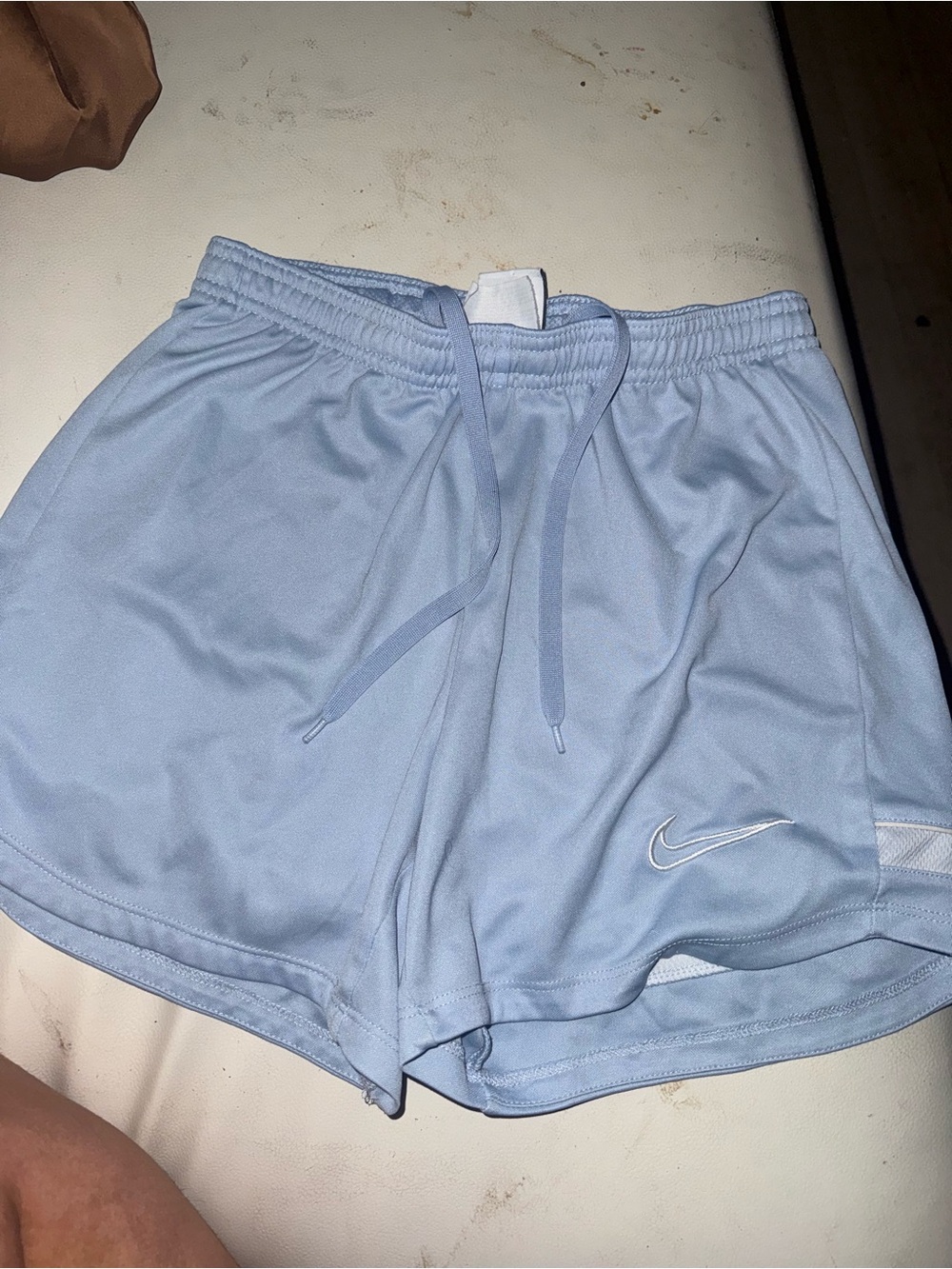 Nike Women's Pale Blue Athletic Shorts with Swoosh